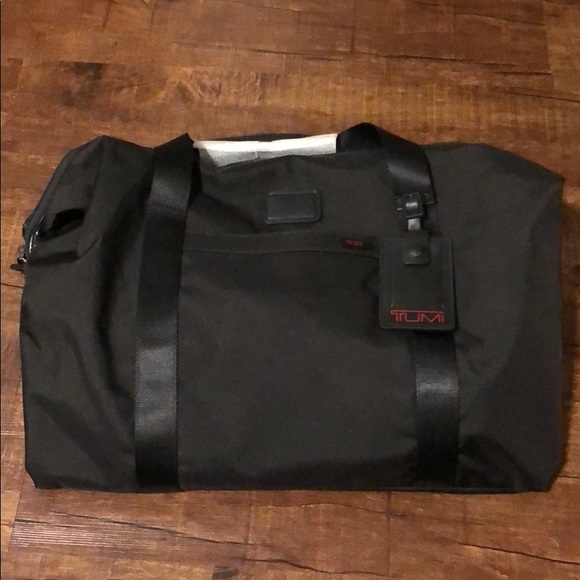 tumi travel satchel
